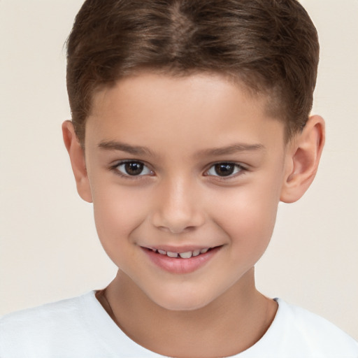 Joyful white child male with short  brown hair and brown eyes