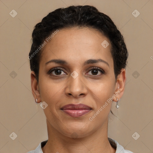 Joyful latino adult female with short  brown hair and brown eyes