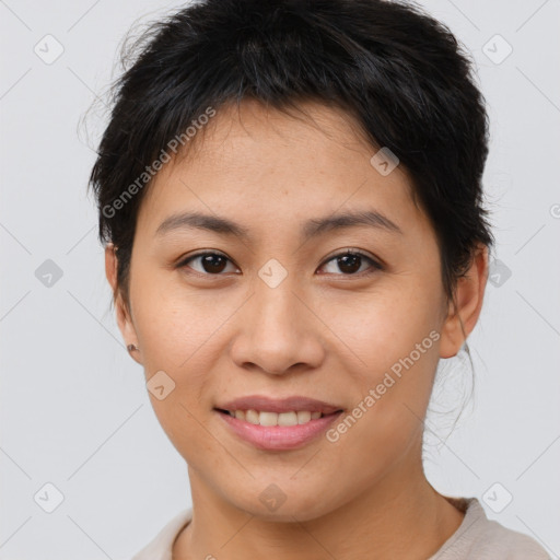 Joyful asian young-adult female with short  brown hair and brown eyes