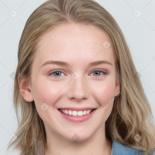 Joyful white young-adult female with medium  brown hair and blue eyes