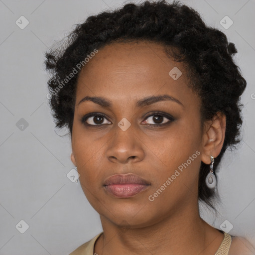 Neutral black young-adult female with short  black hair and brown eyes