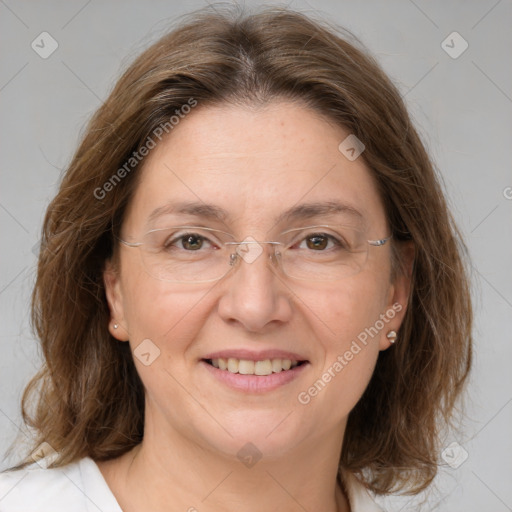 Joyful white adult female with medium  brown hair and grey eyes