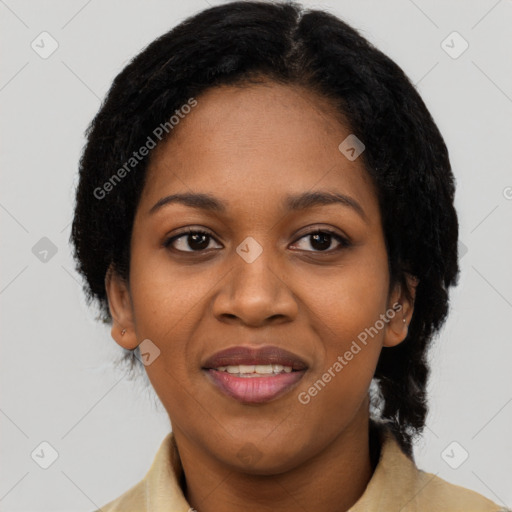 Joyful black adult female with short  black hair and brown eyes