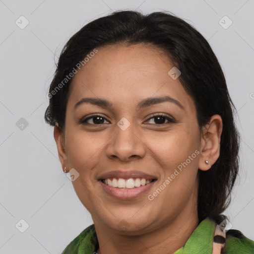 Joyful latino young-adult female with medium  brown hair and brown eyes