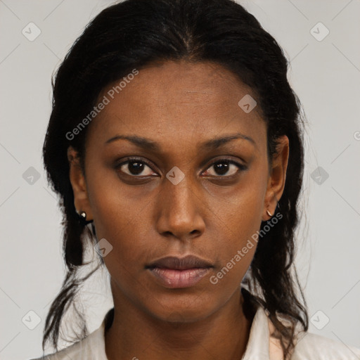 Neutral black young-adult female with medium  brown hair and brown eyes