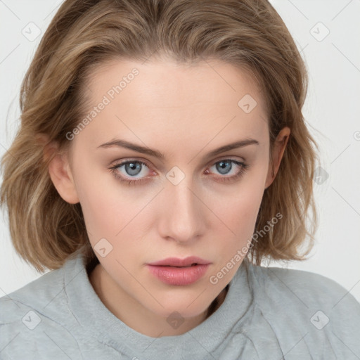 Neutral white young-adult female with medium  brown hair and grey eyes