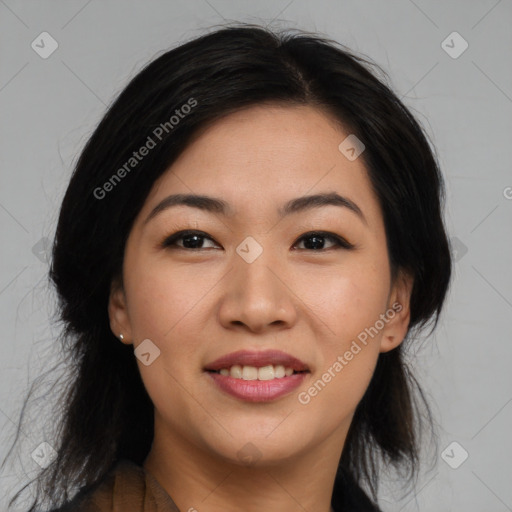 Joyful asian young-adult female with medium  black hair and brown eyes