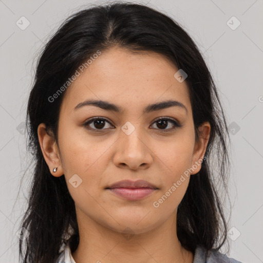 Joyful latino young-adult female with long  brown hair and brown eyes