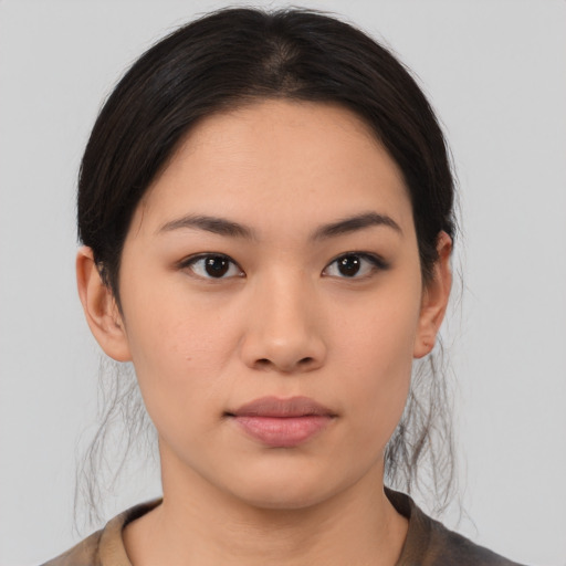 Neutral asian young-adult female with medium  black hair and brown eyes