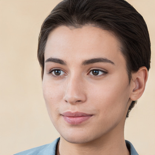 Joyful white young-adult female with short  brown hair and brown eyes