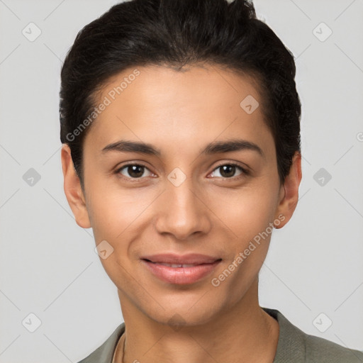 Joyful latino young-adult female with short  brown hair and brown eyes