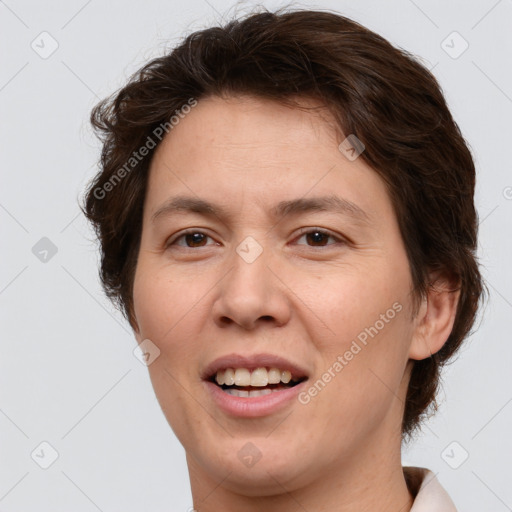 Joyful white adult female with short  brown hair and brown eyes