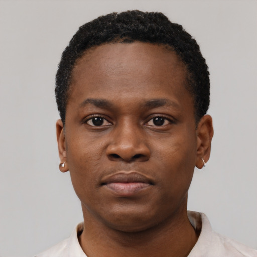 Neutral black young-adult male with short  black hair and brown eyes