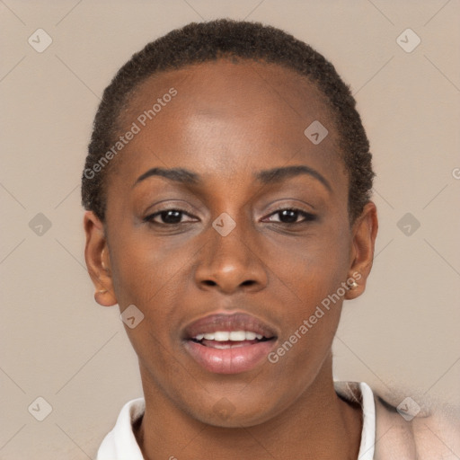 Joyful black young-adult female with short  brown hair and brown eyes