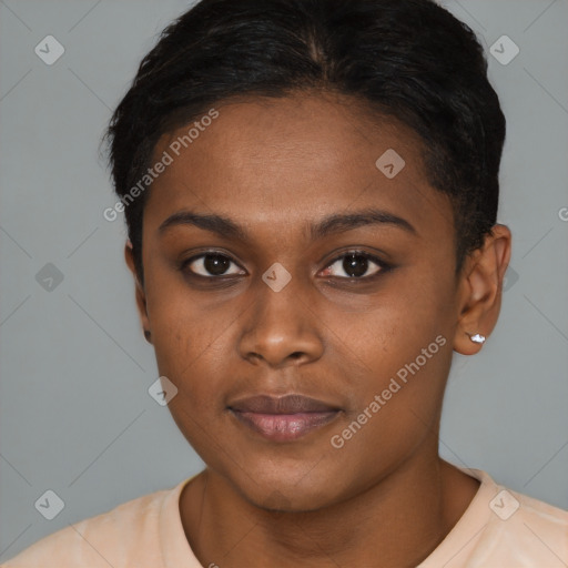 Joyful black young-adult female with short  brown hair and brown eyes