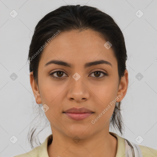 Joyful latino young-adult female with medium  brown hair and brown eyes