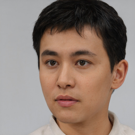 Neutral asian young-adult male with short  black hair and brown eyes