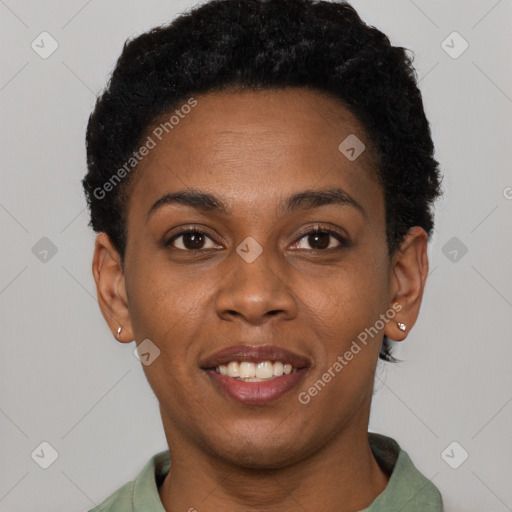 Joyful black young-adult female with short  black hair and brown eyes