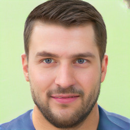 Joyful white young-adult male with short  brown hair and brown eyes