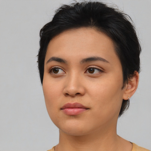 Neutral asian young-adult female with medium  black hair and brown eyes