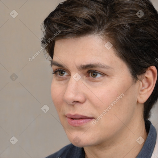 Joyful white adult female with medium  brown hair and brown eyes