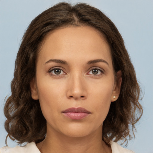 Neutral white young-adult female with medium  brown hair and brown eyes