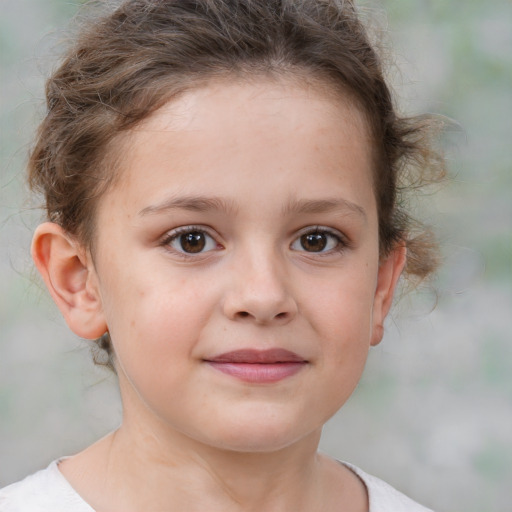 Joyful white child female with short  brown hair and brown eyes