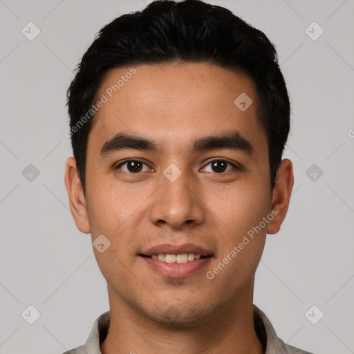 Joyful white young-adult male with short  black hair and brown eyes