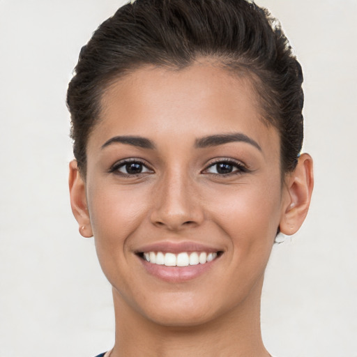 Joyful white young-adult female with short  brown hair and brown eyes