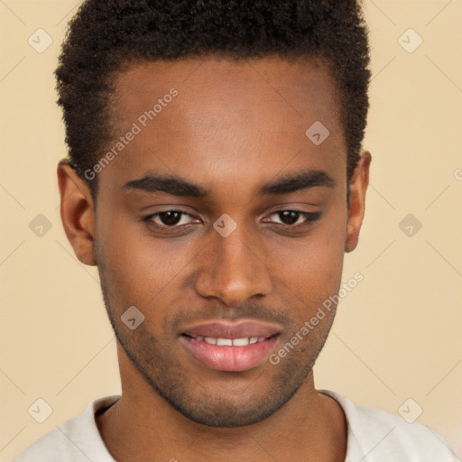 Joyful black young-adult male with short  brown hair and brown eyes