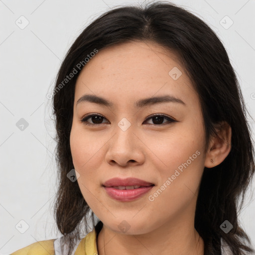 Joyful asian young-adult female with medium  brown hair and brown eyes