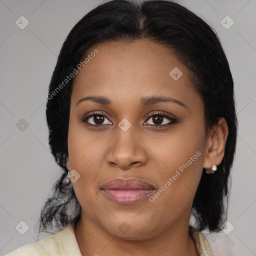 Joyful black young-adult female with medium  brown hair and brown eyes