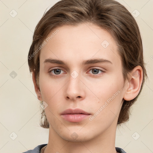 Neutral white young-adult female with medium  brown hair and grey eyes