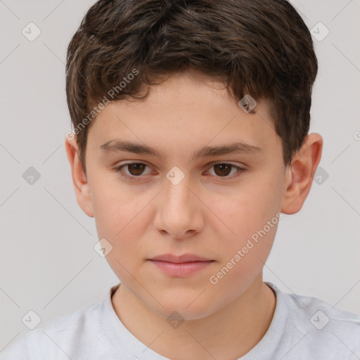 Joyful white child male with short  brown hair and brown eyes