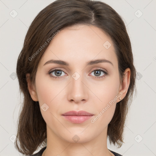 Neutral white young-adult female with medium  brown hair and brown eyes