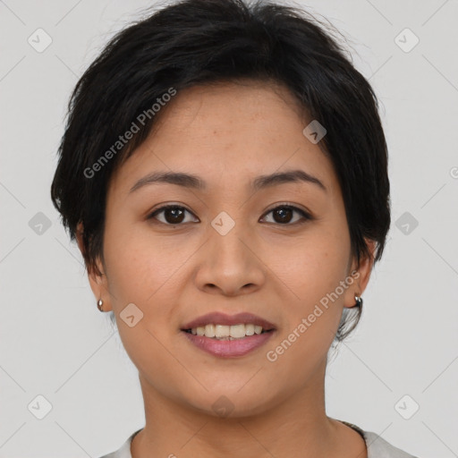 Joyful asian young-adult female with short  brown hair and brown eyes