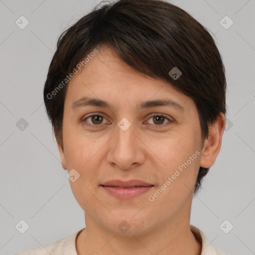 Joyful white adult female with short  brown hair and brown eyes