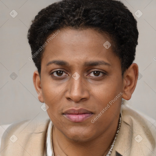 Joyful black young-adult female with short  brown hair and brown eyes