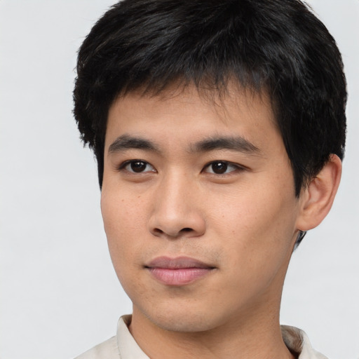 Neutral asian young-adult male with short  brown hair and brown eyes