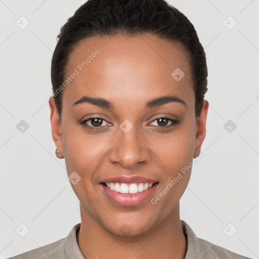 Joyful latino young-adult female with short  brown hair and brown eyes