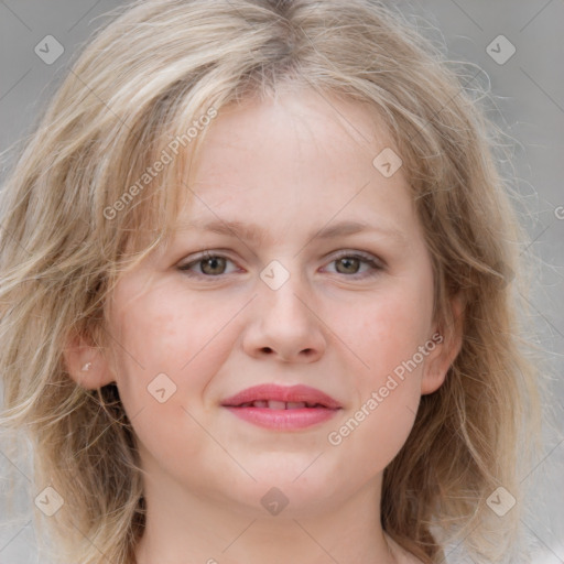 Joyful white young-adult female with medium  brown hair and blue eyes