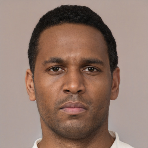 Neutral black young-adult male with short  brown hair and brown eyes