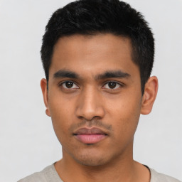 Neutral asian young-adult male with short  black hair and brown eyes