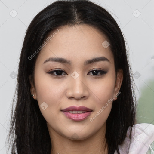 Joyful asian young-adult female with long  brown hair and brown eyes