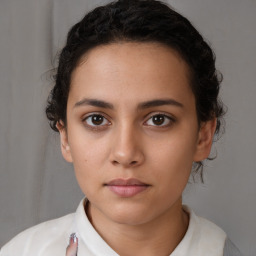 Neutral white young-adult female with short  brown hair and brown eyes