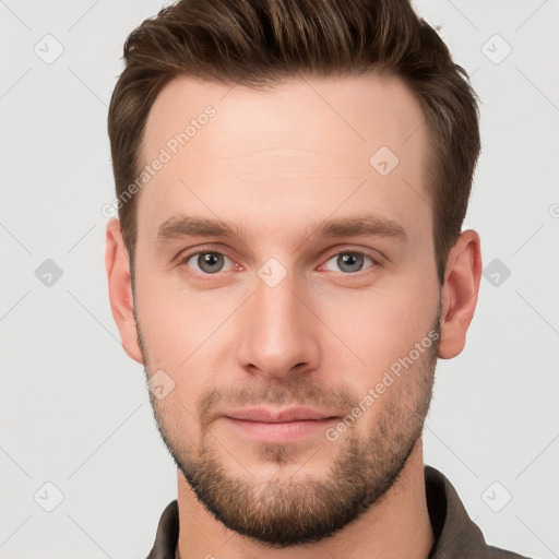 Neutral white young-adult male with short  brown hair and grey eyes