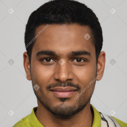 Joyful black young-adult male with short  black hair and brown eyes