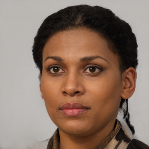 Neutral black young-adult female with short  black hair and brown eyes