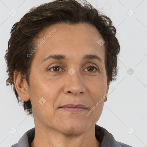 Joyful white adult female with short  brown hair and brown eyes