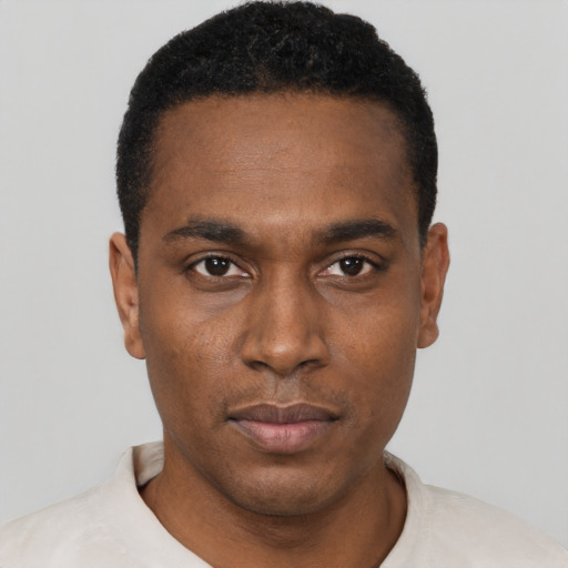 Neutral black young-adult male with short  black hair and brown eyes